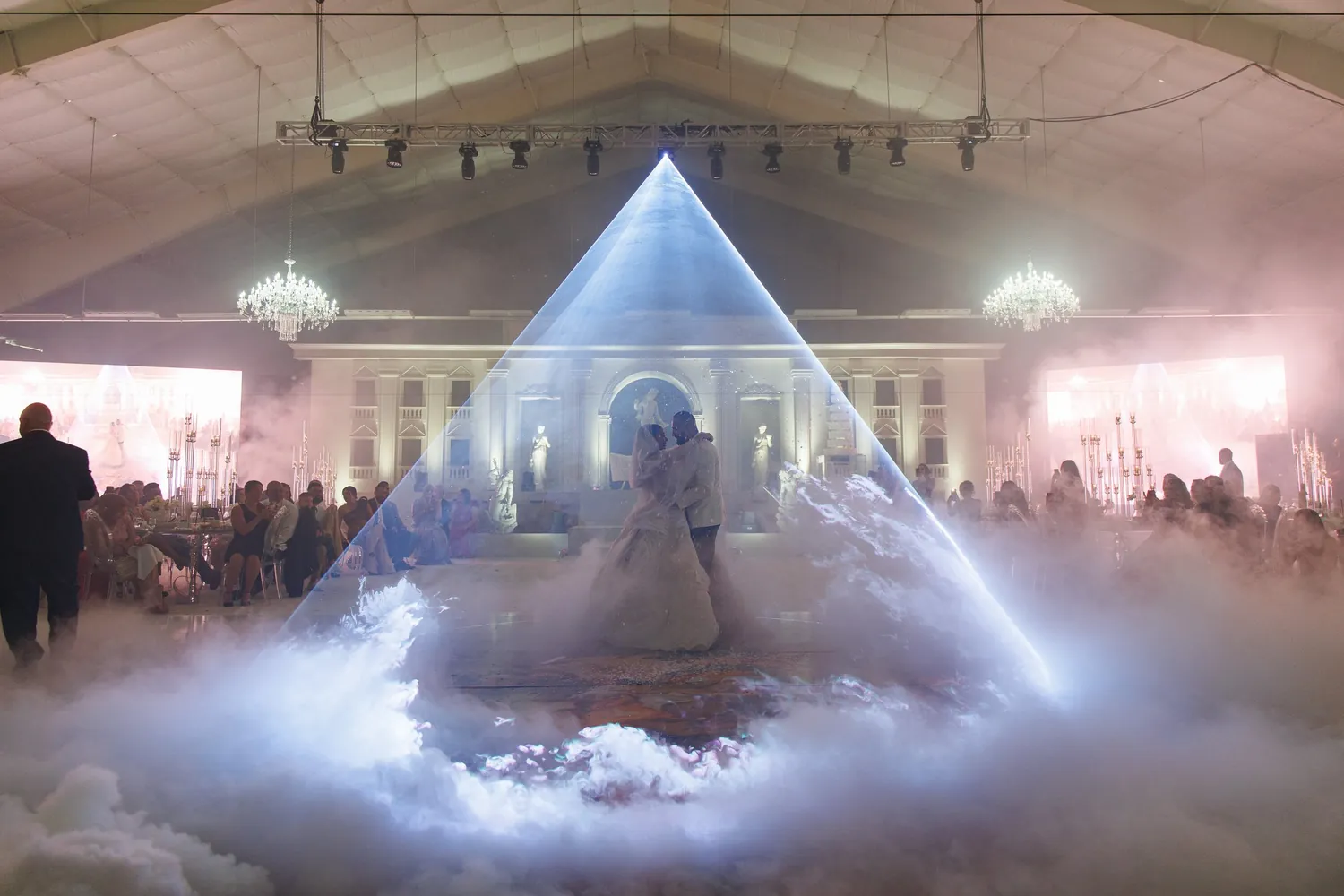 First dance under a laser halo at a wedding, photo 11